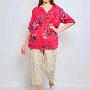 Blouse fleurie avec boutons et col effet cravate