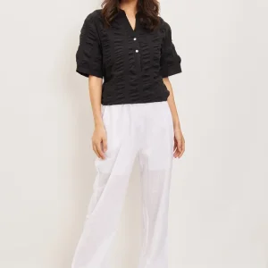 Blouse asymétrique à plis