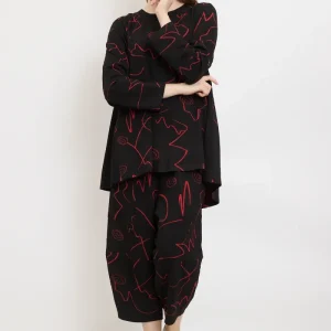 Pantalon à traits et spirales fantaisistes